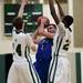 Pioneer senior Aedan York is defended by Father Gabriel Richard players on Tuesday. Daniel Brenner I AnnArbor.com